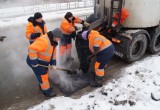 Городские власти отчитались об укладке асфальта в снег