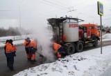 Городские власти отчитались об укладке асфальта в снег